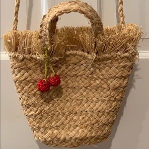 Straw crossbody with cherry detail
